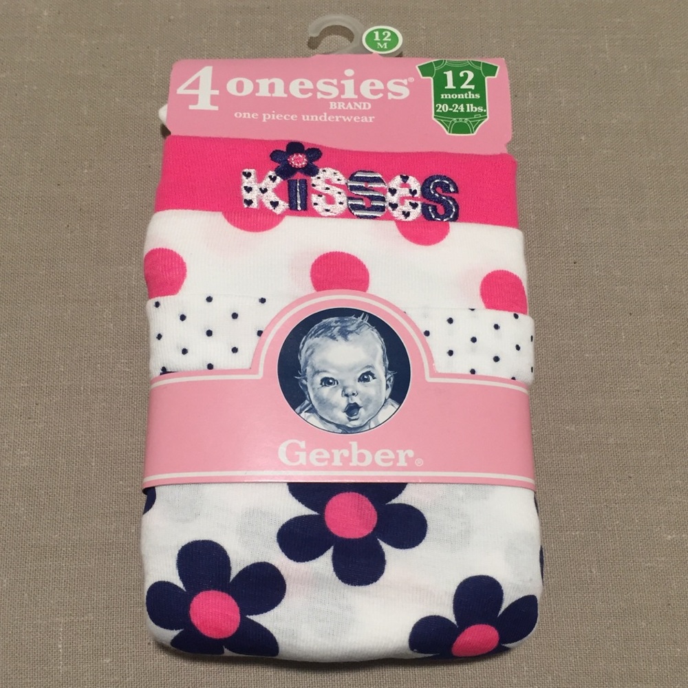 Pack of 4 new girls onesies. Pink, white, and navy